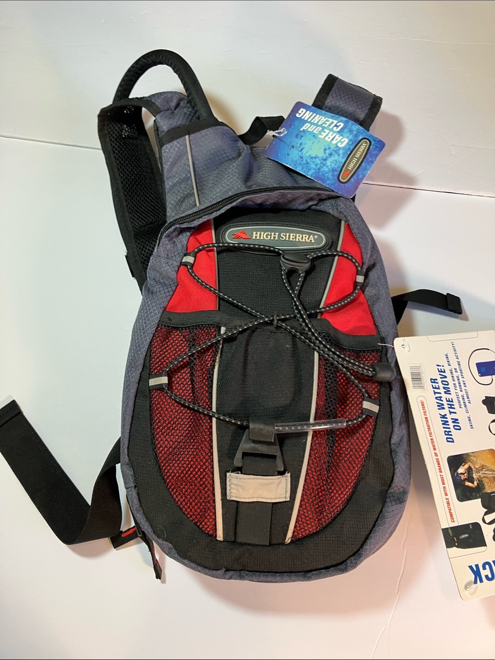 High Sierra Red and Gray Hydration Pack with Bungee Front